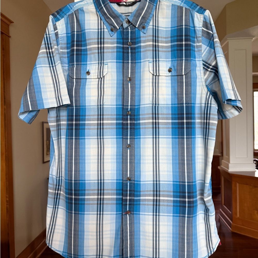 The Northface Large Blue Plaid Men's Shirt Short Sleeve Button Front.